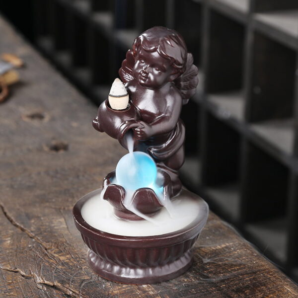 Angel Boy Ceramic Water Fall Incense Holder With LED Lamp Angel Boy Ceramic Water Fall Incense Holder With LED Lamp