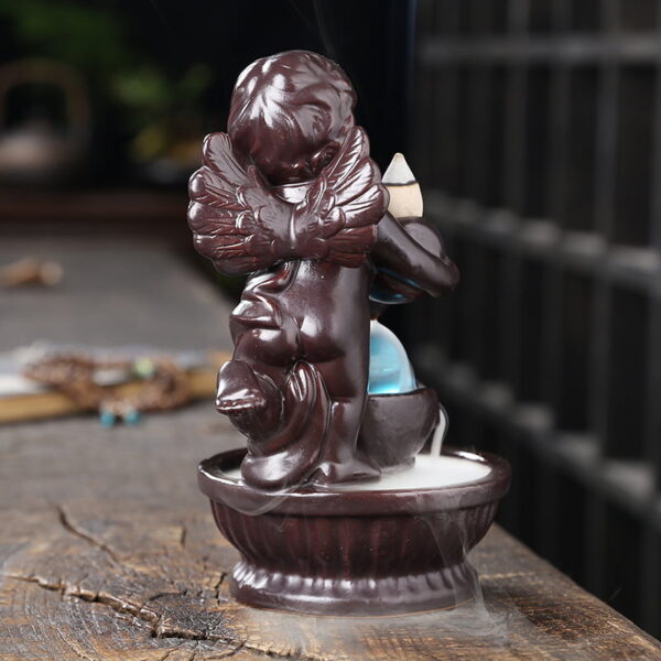 O1CN01XOyJXs1kW4HKeK6uR_!!2551464690-0-cib Angel Boy Ceramic Water Fall Incense Holder With LED Lamp