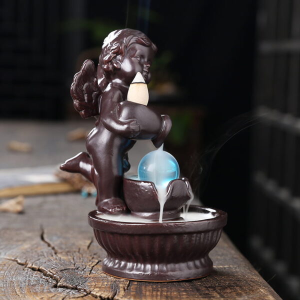 O1CN01yYfOiQ1kW4HXfqIaK_!!2551464690-0-cib Angel Boy Ceramic Water Fall Incense Holder With LED Lamp